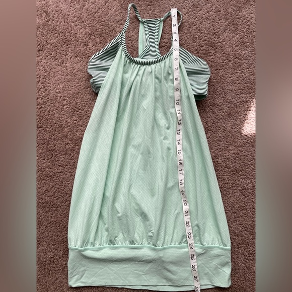 lululemon athletica Tops - Gorgeous mint green & black lululemon tank top. Built in bra. Size 4.